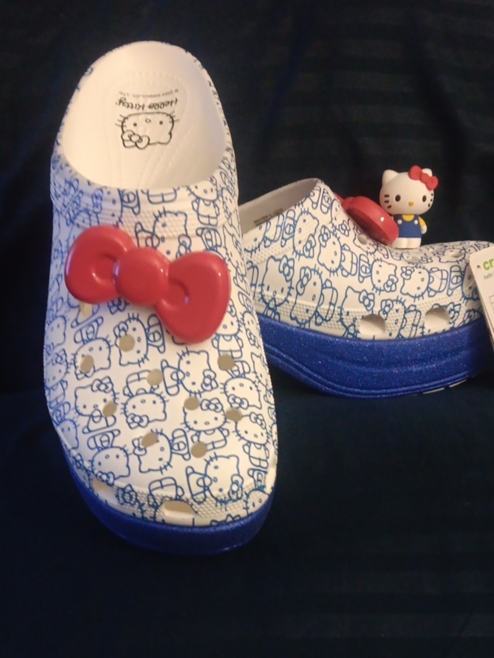 Hello Kitty White Slip-On Clogs with Blue Sole and Red Bow Charm
